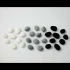 24 White ceramic pebbles